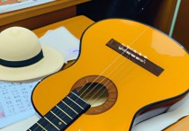 38寸吉他适合男生玩吗